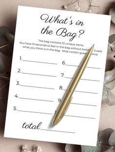 what's in the bag? printable game with gold pen and flowers on top