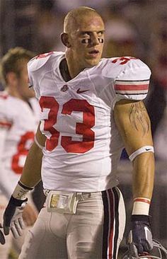 a football player is standing on the field