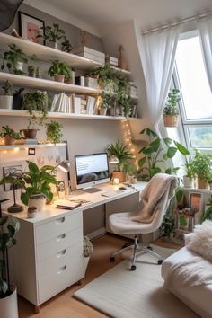 an office with plants and books on the shelves, along with a computer desk in front of a window