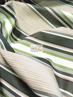 a close up view of a green and white striped fabric