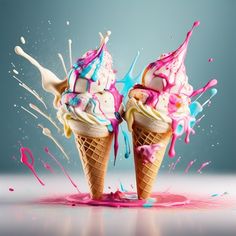 two ice cream cones with pink and blue sprinkles