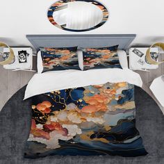 a bed with a white comforter and two pillows on top of it next to a round mirror