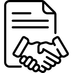 two hands shaking over a document