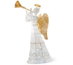 an angel figurine with a trumpet in its hand and sparkling lights around it