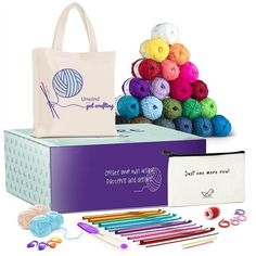 the kit includes yarn, crochet hooks and knitting needles