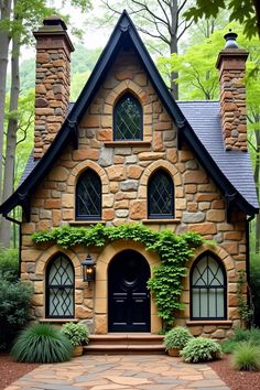 Cozy stone cottage with arched windows and ivy. The undeniable charm of cottage homes brings a rustic fairytale to life with each brick and beam.