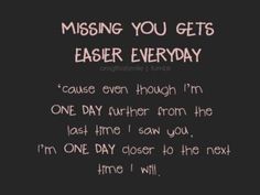 the message is written on a blackboard with white writing and pink lettering that reads, missing you gets easier everyday cause even though i'm