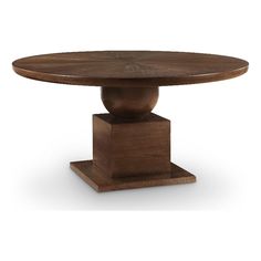 an oval wooden table with pedestals on the top and base, against a white background