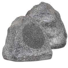 two gray rocks sitting next to each other