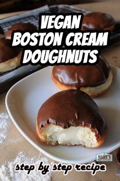 vegan boston cream doughnuts on a white plate