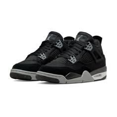 the nike air jordan iv is in black and grey