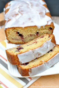 a loaf of cake sitting on top of a white plate