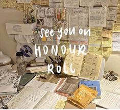 there are many papers and pens on the desk with words above them that read see your honour roll