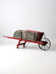 an old wooden wagon with wheels on a white background