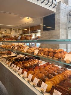 a bakery filled with lots of different types of pastries