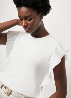 White Cotton Pleated T-Shirt White Ruffled Crew Neck T-shirt, Elegant Cap Sleeve Tops For Summer, Elegant Summer Top With Cap Sleeves, Chic Pleated Cotton Top, Fitted Ruffle Crew Neck T-shirt, White Cap Sleeve Top For Spring, Fitted Ruffled Crew Neck T-shirt, Fitted Crew Neck T-shirt With Ruffles, Pleated Relaxed Fit Tops For Summer