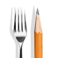 an orange pencil next to a silver fork