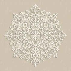 a white lace doily on a beige background