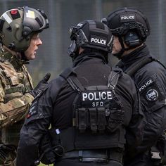 two police officers talking to each other