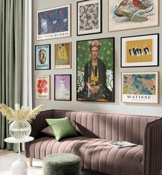 a living room filled with lots of pictures on the wall above a couch and coffee table