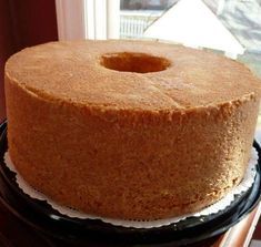 a round cake sitting on top of a plate