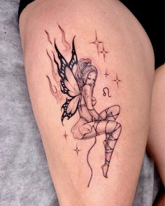 a woman's thigh with a fairy tattoo on it