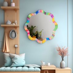 a mirror on the wall above a bench with pillows and plants in vases next to it