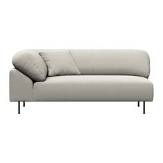 a white couch with two pillows on it's back and one arm folded up