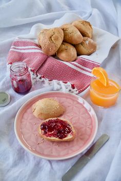 a plate with some cookies and jam on it