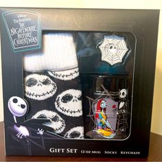 the nightmare before christmas gift set includes two socks and a bottle