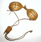 two wooden mouses connected to each other on a white surface with cross marks in the middle