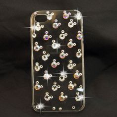 an iphone case with lots of diamonds on it