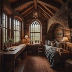 a bedroom with wood floors and windows in the wall, along with a bed that has a blanket on it