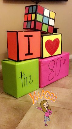 three blocks with the words i love the 80's written on them and one block has