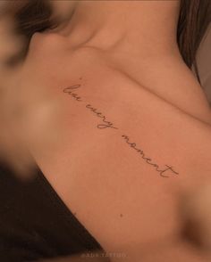 a woman's chest with the words, thank you mom written on her left side