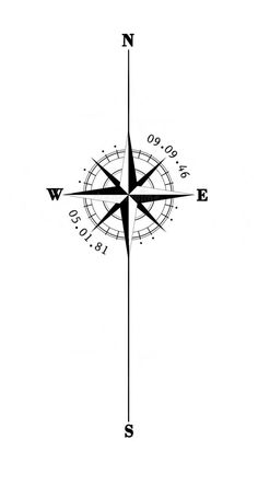 a black and white photo of a compass with the word w e s on it