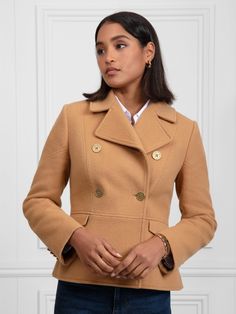 Beautifully tailored, the Victoria Jacket draws inspiration from the coat of the same name, taking your outerwear wardrobe to new heights. Double breasted, for classic elegance, with princess seaming and a fitted waist for a superbly flattering silhouette. Individually handmade in Portugal from exceptional quality Italian wool and fully lined with piping, it’s finished with antique brass buttons, chevron detail on the back, sleeves and pocket flaps, and a neckline that you can wear open or butto Formal Structured Wool Coat With Double-breasted Buttons, Formal Structured Double-breasted Pea Coat, Elegant Sport Coat With Lapel Collar And Button Closure, Classic Tweed Jacket With Double-breasted Button, Classic Tweed Jacket With Double-breasted Button Fastening, Classic Structured Double-breasted Pea Coat, Classic Formal Wool Coat With Double-breasted Button Fastening, Classic Double-breasted Wool Coat For Formal Occasions, Luxury Pea Coat With Notch Lapel For Office