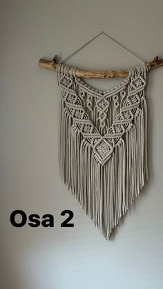 the wall hanging is made with macrame yarn