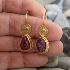 This Dangle & Drop Earrings item by atalantasilver has 518 favorites from Etsy shoppers. Ships from Clifton, NJ. Listed on Nov 23, 2023 Gold Earrings Vintage, Silversmith Earrings, Ruby Aesthetic, Ruby Earrings Gold, Fantasy Earrings, Jewelry Ruby, Minimalist Earring, Earring Dangle, Pink Ruby