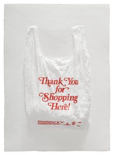 a thank you for shopping bag on a white paper background with red writing that says, thank you for shopping here