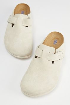 Classic Birkenstock Boston clogs with a soft footbed. Essential suede clogs with buckle closures at the sides. Features a molded footbed for comfortable wear and a textured EVA outsole. Features Birkenstock Boston soft footbed clog Slip on suede clogs Buckle side closure Molded footbed Textured outsole Content + Care Suede, leather, rubber Spot clean Imported Size + Fit Birkenstock regular width Fits like a medium D width | Birkenstock Boston Soft Footbed Clog in Antique White, Men's at Urban Ou White Boston Clogs, Birkenstock Boston Soft Footbed, Birkenstock Boston Clogs, Boston Soft Footbed, White Birkenstocks, White Nike Shoes, Preppy Shoes, Pretty Shoes Sneakers