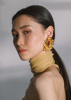 The Kaleen Earrings draw inspiration from the gardens of Versailles, cleverly combining organic forms with Baroque decadence. Made by hand in New York, each petal is carefully sculpted, and imbued with the organic movement of a real flower. Complete with a carefully etched surface in a rich gold tone, the flowers are scattered with crystals in a variety of shapes and sizes for a sparkling effect. Dimensions: 2.5 inch length Gardens Of Versailles, Versailles Garden, Rose Rise, Julia Berolzheimer, Organic Forms, Fall Accessories, Fine Jewelry Gift, Rose Earrings, Gold Set