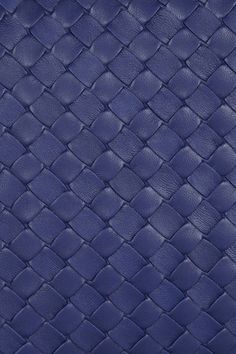 a blue leather texture with woven lines