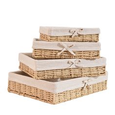 three wicker baskets stacked on top of each other