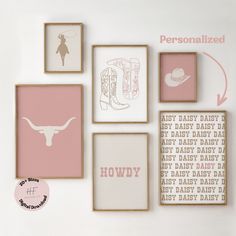 a white wall with pink and brown framed art on it, including baby's names