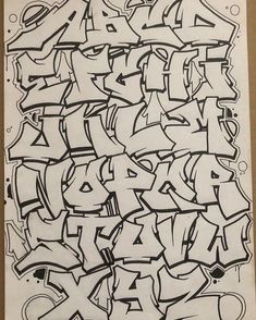 graffiti written in black and white ink on paper