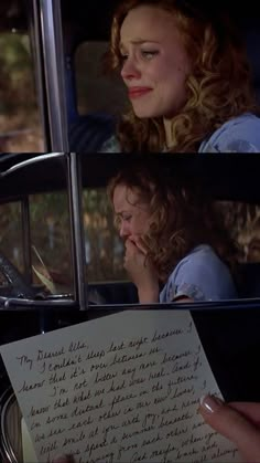 a woman sitting in the back seat of a car holding a piece of paper with writing on it