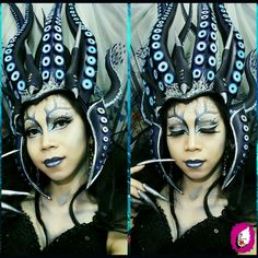 the woman is wearing an octopus headdress with blue and black decorations on her face