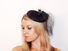 Look STUNNING anywhere you go in this timeless black fascinator hat. This hat is 6 inches wide, with a 7 inch veil (approximately.) This fascinator is topped off with 4 black flowers, dazzling black beading and a net veil. 2 silver barrette clips attach the hat easily to the head and keep it in place. Works for all hair styles - this piece is elegant, classy and perfect for any occasion! All of our items are handmade by a member of our shop. Our crowns, tiaras and jewelry are made of a thicker p Small Tea Party, All Hair Styles, Net Veil, Pink Fascinator, Black Fascinator, Tea Party Hats, Wedding Fascinators, Fascinator Hat, Cocktail Hat