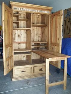 a wooden desk and cabinet in a room